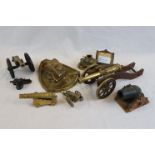 A Collection Of Cannon And Tank Ornaments To Include Brass Calendar Holder, Brass Trinket Dish, And