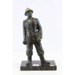 Bronzed figure of a French Fireman on a Marble base