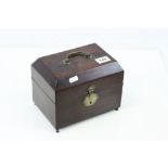 An early 19th century mahogany apothecary box raised on four feet with six glass bottles with