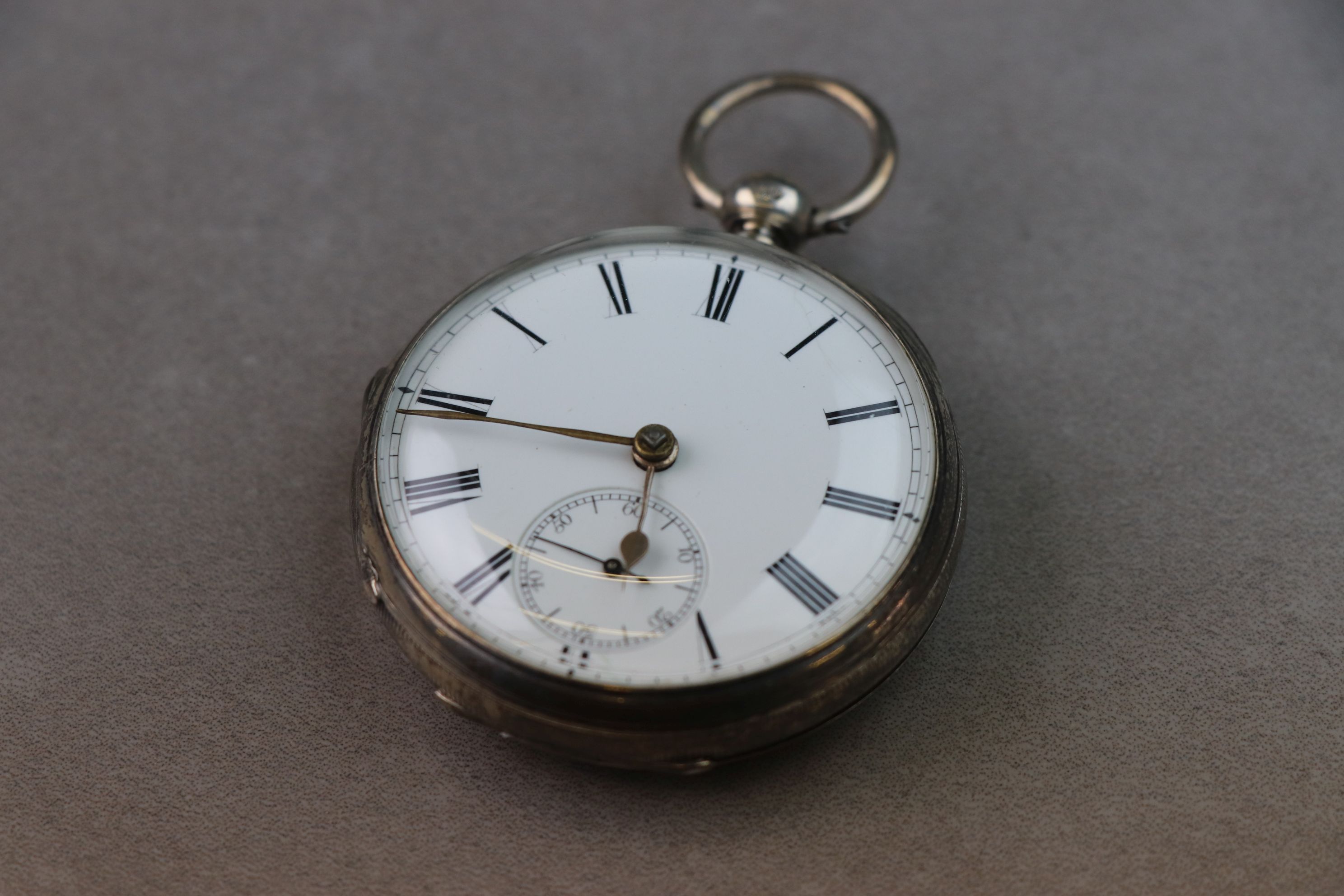 Victorian silver open face key wind pocket watch, white enamel dial and subsidiary seconds dial (