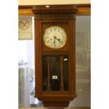 Early 20th century Oak Cased Hanging Wall Clock with Silvered Dial and Arabic Numerals