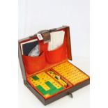 Vintage Leather Cased Mahjong Set, the clasp stamped Dakwanhwa together with Four Wooden Stands