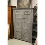 Substantial Housekeepers Cupboard with Arched Panel Doors