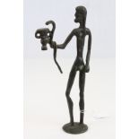 Vintage Bronze Sculpture of a Greek Man holding an Oil Lamp