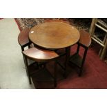 Circular Mahogany Coffee Table with a Nest of Four Quarter Tables below