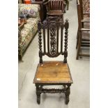 Victorian Oak Hall Chair, the back with heavily carved entwined leaves and barley twist supports