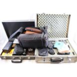 Camera Case with a Minolta XG-M Camera and Accessories and Two other Cases with Cameras and