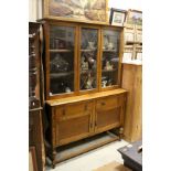 Early 20th century Oak Dresser, the upper section with three glazed doors, above two drawers and two