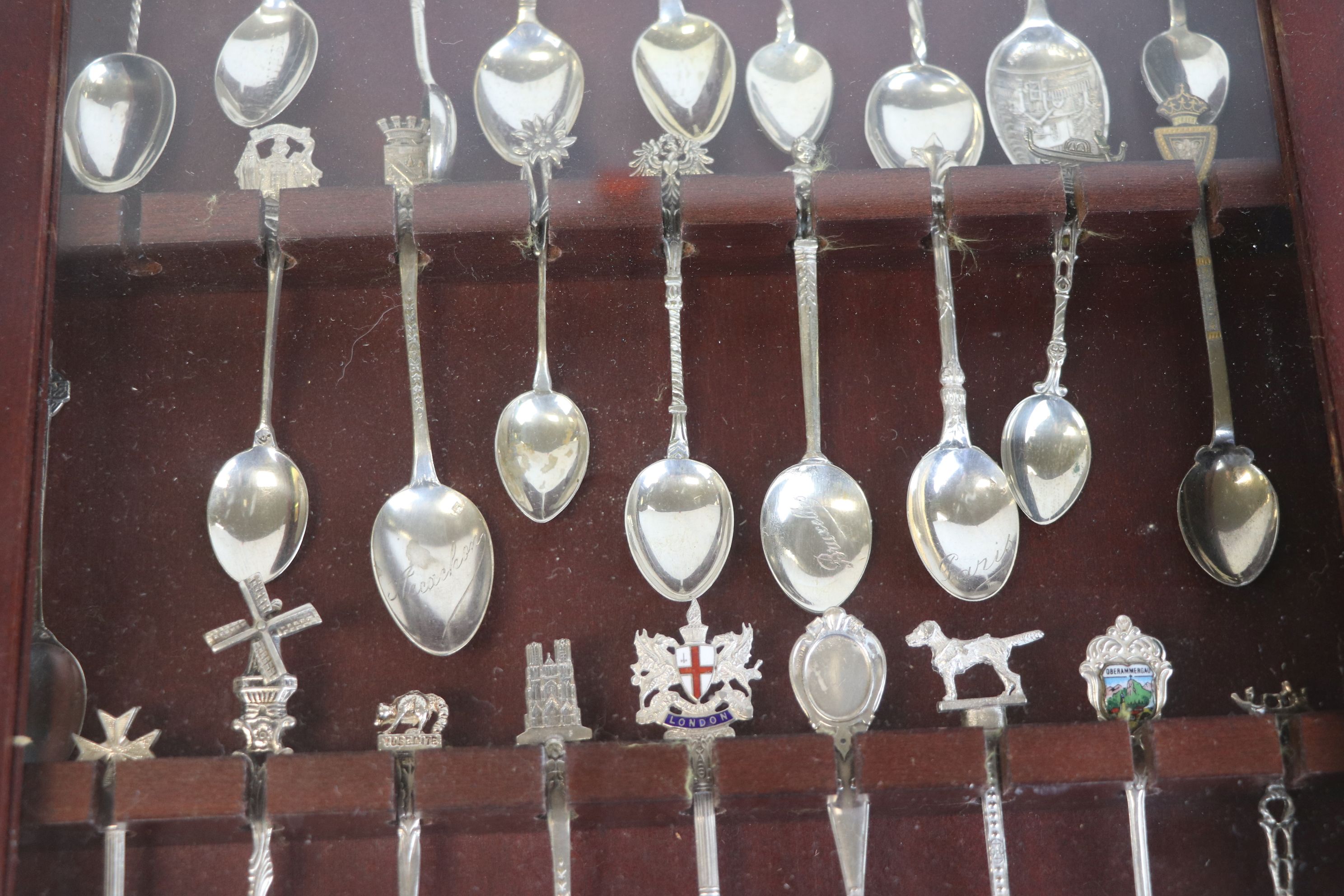 Souvenir teaspoons, some with enamelled finials, approximately 27 in total contained within display - Image 3 of 5