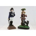 Two painted Cast Iron door stops, one designed as a Woodsman, the other a Naval Officer