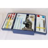 Boxed child's microscope set to include microscope, sample tubes, glass slides, solutions etc