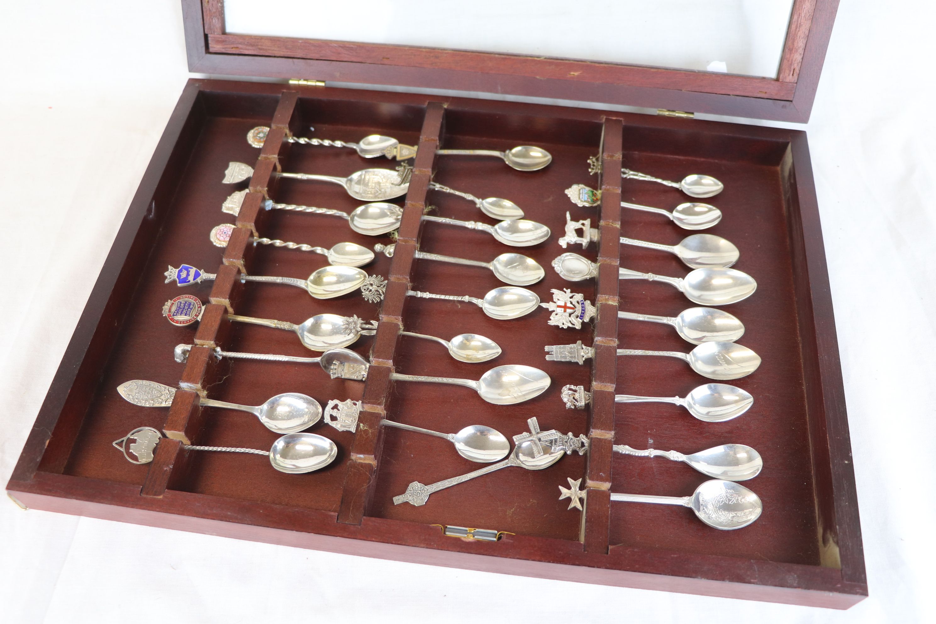 Souvenir teaspoons, some with enamelled finials, approximately 27 in total contained within display - Image 5 of 5