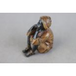 Cold Painted Bronze Arab Figure of a Seated Boy