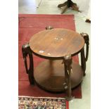 African Ethnic Hardwood Circular Coffee Table, the four legs carved in the form of elephants with