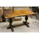 Oak Jacobean Style Refectory Style Dining Table raised on carved bulbous cup and cover supports,