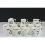 Set of 12 Royal Worcester coffee cups & saucers with hand painted Flowers and gilt detailing