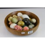 Wooden Bowl with a Collection of approx. Twenty Three Stone Eggs