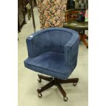 Tub Office Chair, upholstered in blue fabric on wooden base with castors