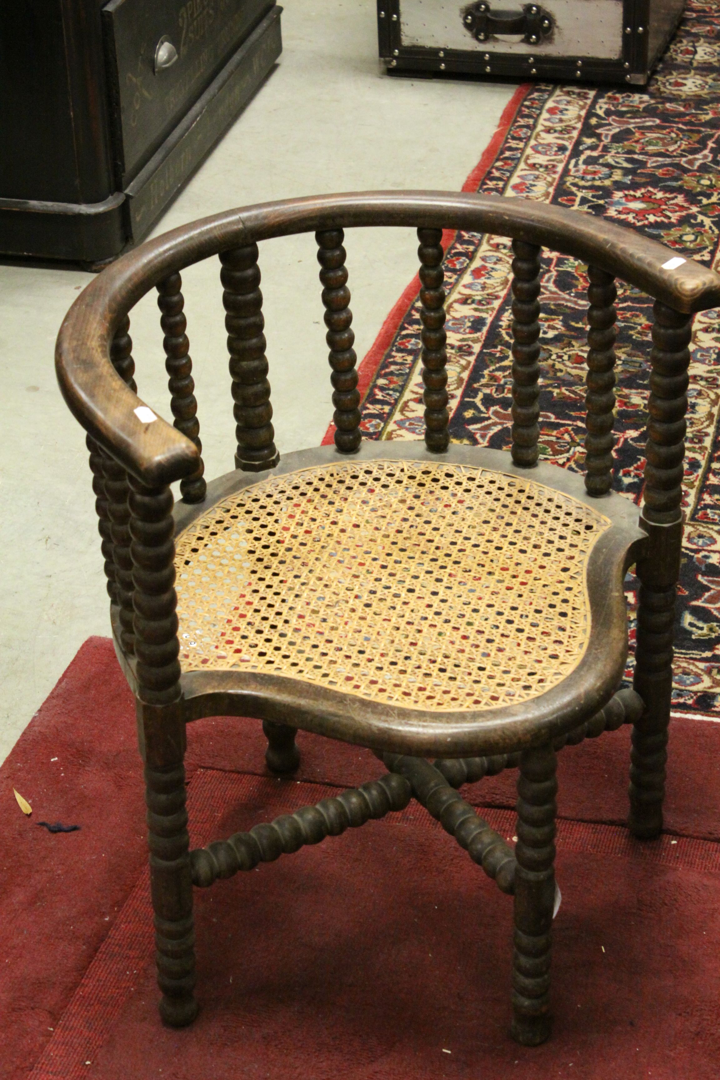 Early 20th century Oak Tub Corner Chair with Bobbin Supports and Cane Seat