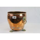 Copper Rivetted Planter / Jardiniere with Brass Ringed Lion Mask Handles and Three Brass Paw Feet