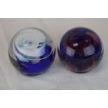 Two Michael Harris Isle of Wight glass footed paperweights, signed to base, swirl design, blue and