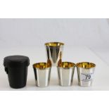 Set of Four White Metal Stacking Hunting / Stirrup Cups with Gilt Interiors in Case
