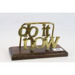Brass Letter Rack ' Do It Now ' on wooden base