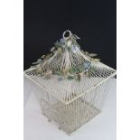 White Finished Metal Bird Cage decorated with a garland of metal painted flowers
