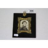 Black and white miniature portrait depicting a Victorian Officer, ebony and gilt frame, paper