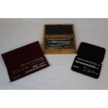 Wedoco cased drawing set together with a cased E.H.Ltd cased drawing set and an incomplete cased