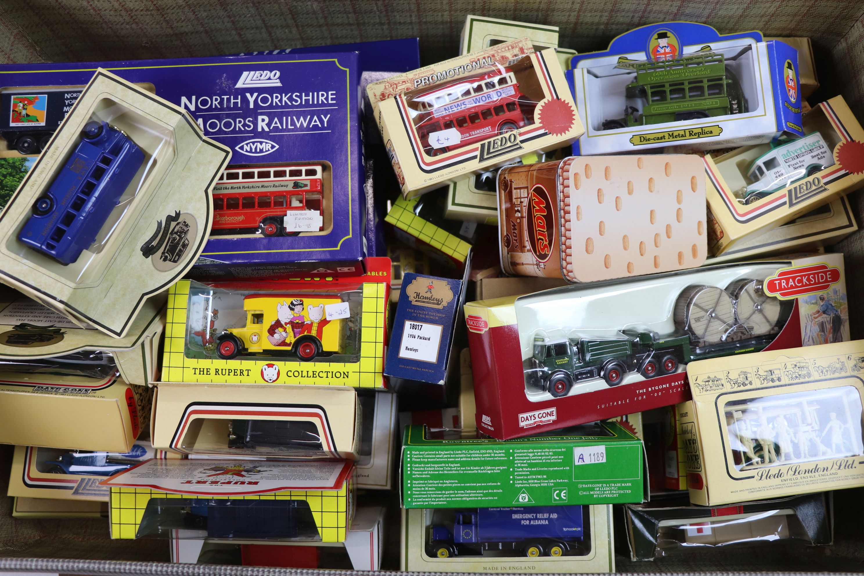 Suitcase containing 50+ boxed diecast models, to include Lledo, Corgi, Oxford Diecast etc