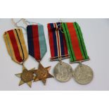 A World War Two Medal Group To Include The British War Medal, The Defence Medal, The 1939-1945
