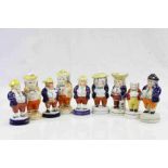 Collection of 9 Staffordshire Pepperette and other figurines