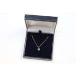 14ct yellow gold pendant set with emeralds and diamonds