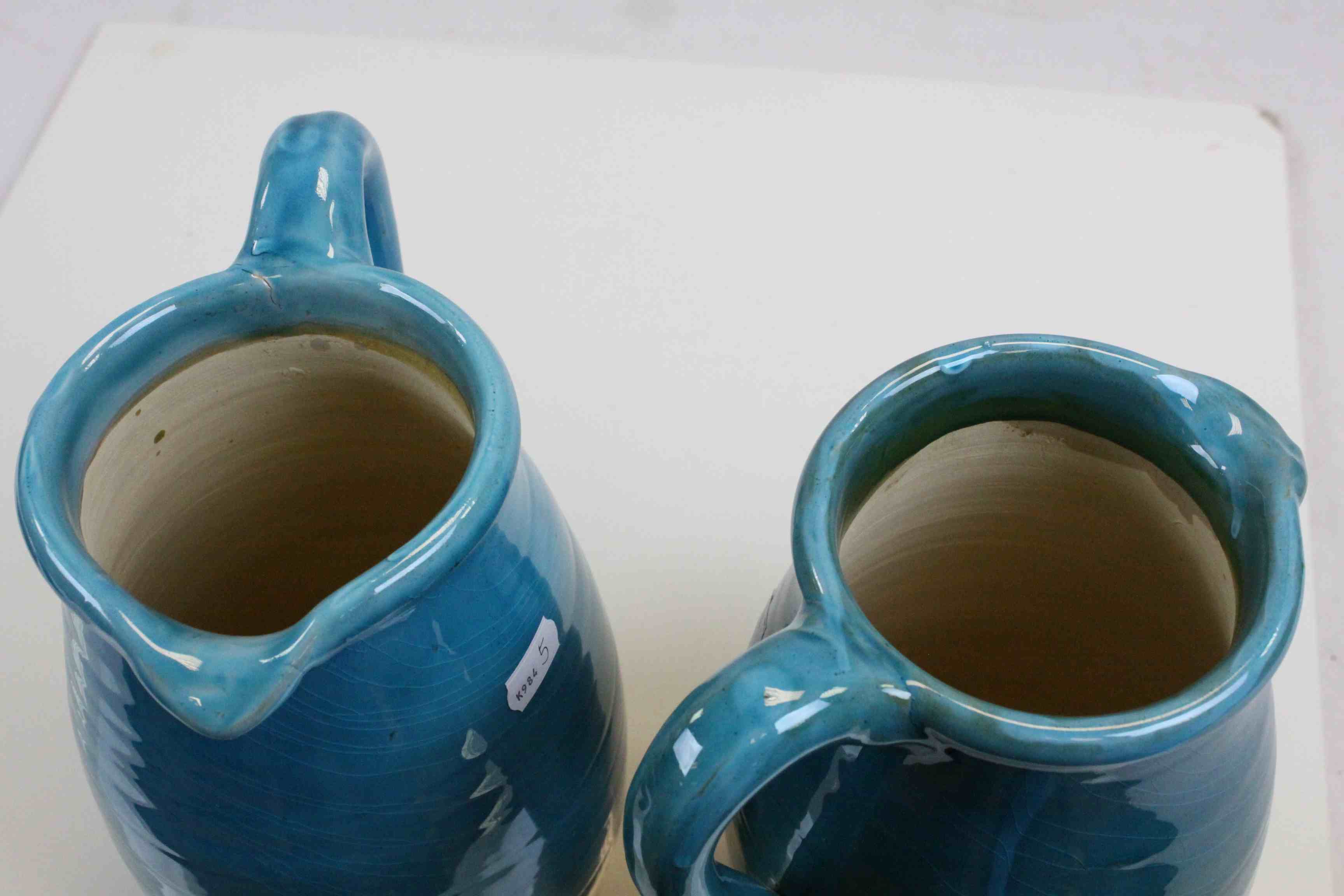 Two Persian Cyan Glazed Pitchers / Water Jugs, approx. 25cms high - Image 3 of 5