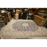 Iranian Hand Knotted Carpet, Cream and Blue Ground, the central panel with a pattern of flowers,