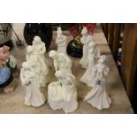 Nine unpainted, glazed Royal Worcester figurines with babies to include; Sweet Dreams, Mothers Love,