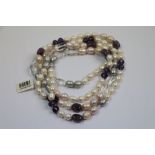 Long necklace of baroque freshwater pearls with crystals and amethysts