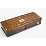 Oak Cribbage box, inset with Bone discs and containing two packs of playing cards and vintage Bone