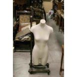 Atrezzo Shop Display Female Torso Mannequin hanging from a Bronze Effect Metal Stand, on castors