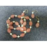 Necklace and matching earrings set with faceted rose quartz and pearls