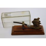 Cased tobacco pipe signed C Crop London, the bowl in the form of the head of the Duchess of