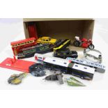 A quantity of model buses ,cars bikes etc.