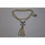 Long necklace of freshwater pearls and CZ in designer style