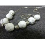 Silver necklace set with white and grey hard stone and silver beads