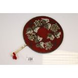 19th century Circular Woolwork Face Guard with Bead Work in the form of leaves and Turned Bone