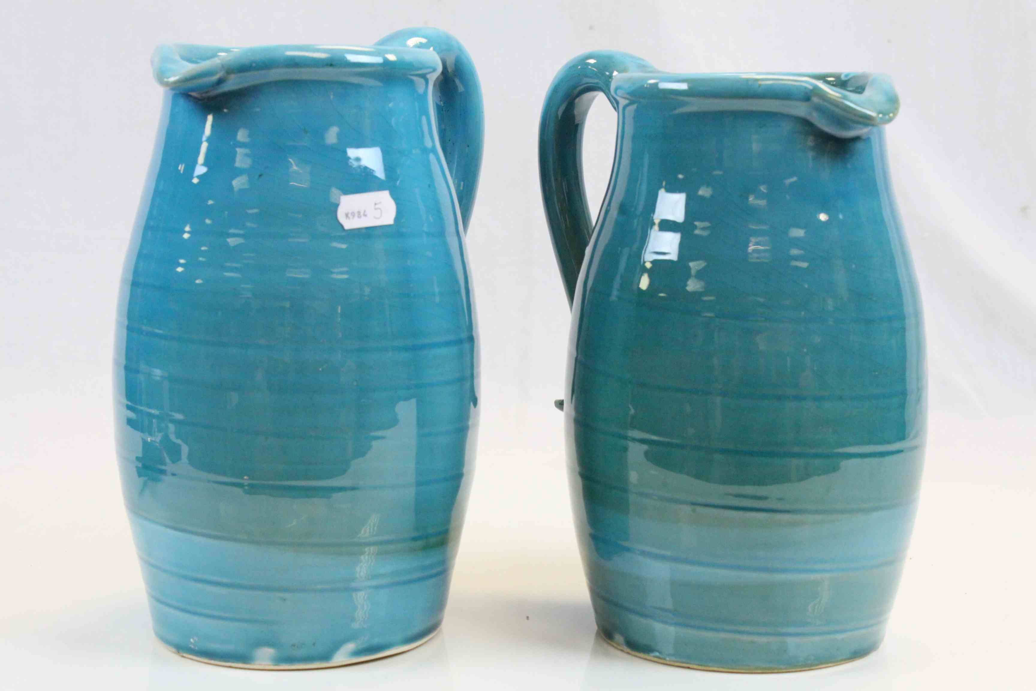 Two Persian Cyan Glazed Pitchers / Water Jugs, approx. 25cms high - Image 5 of 5