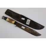 Bone handled field knife, with leather sheath, length of blade approximately 20cm
