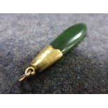 Jade type pendant with yellow metal collar and bale, length approximately 4.5cm