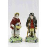 Pair of 19th Century Staffordshire figures "Old Age"